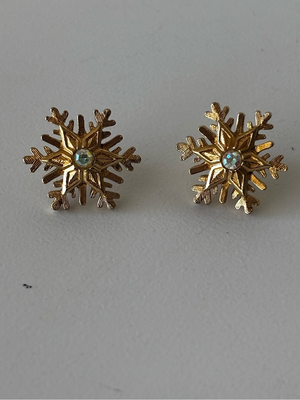 Avon Gold Tone and Aurora Borealis Rhinestone Snowflake Earrings 1”